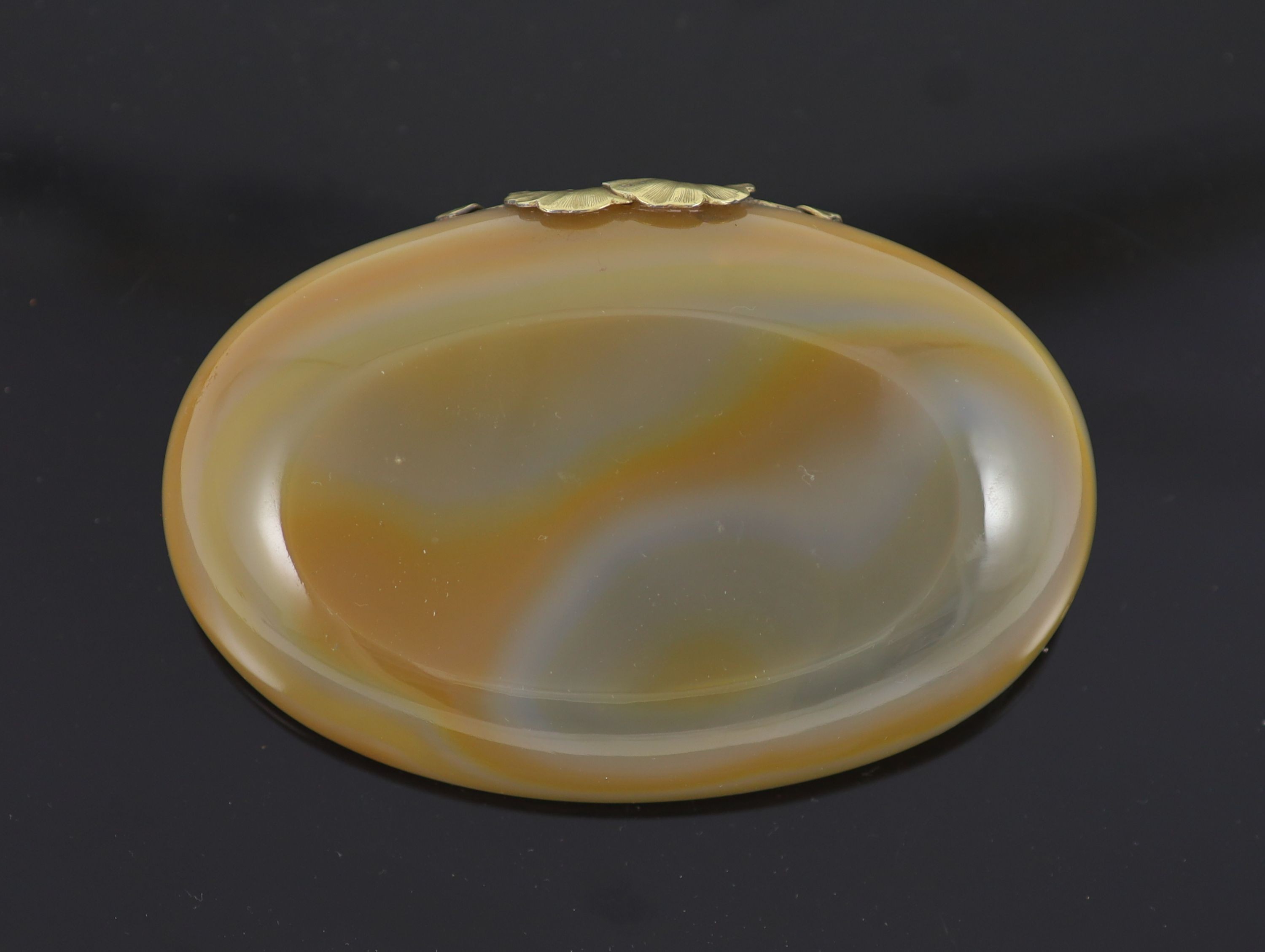 An early 20th century Boucheron silver gilt mounted banded agate oval bowl